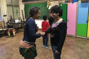 Foto de workshop com migrantes